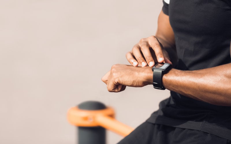 Close up of man checking his smart watch.