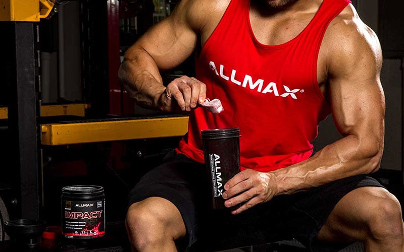 ALLMAX Athlete taking a preworkout supplement