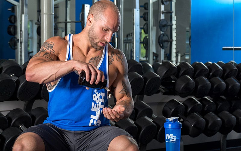 Athlete Taking Vitamin D supplement