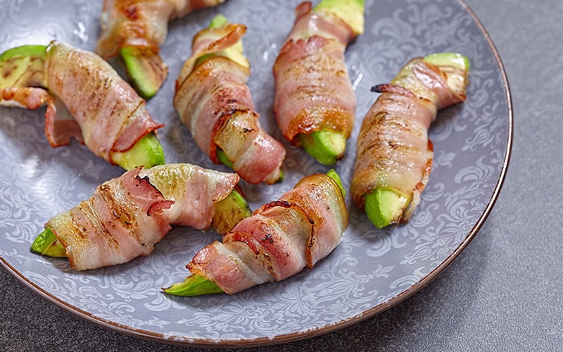 Bacon wrapped avocado slices