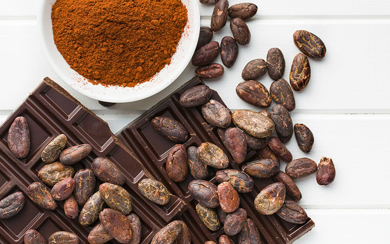 Dark chocolate, beans, and powder