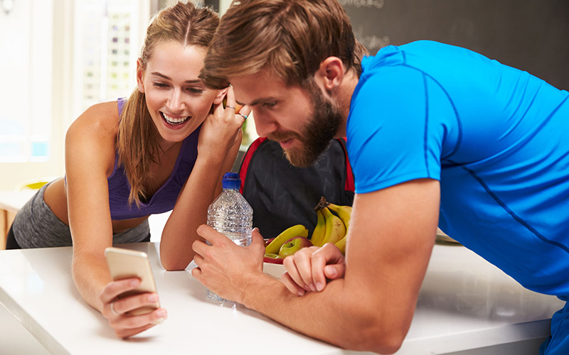 Couple using iphone for hormonal profiling