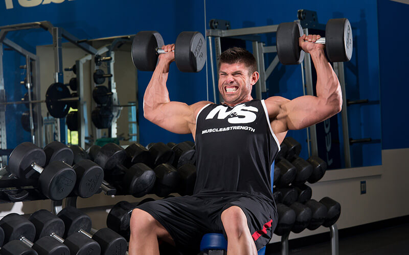 M&S Athlete Performing Dumbbell Shoulder Press