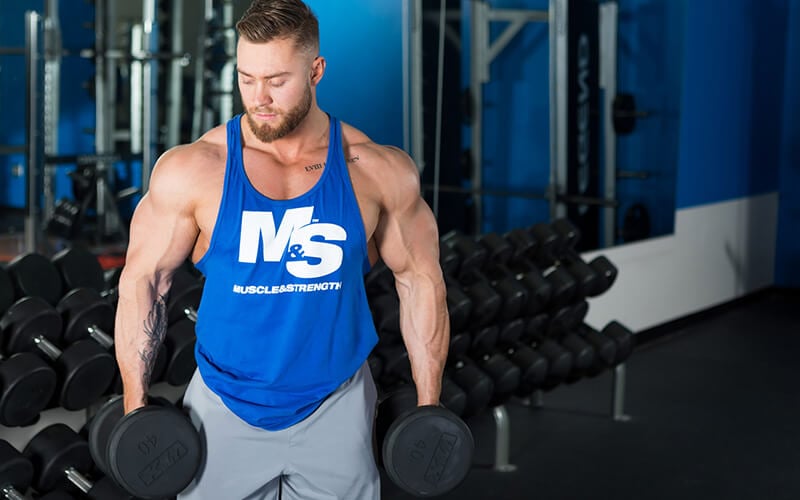 M&S Athlete Holding Dumbbells