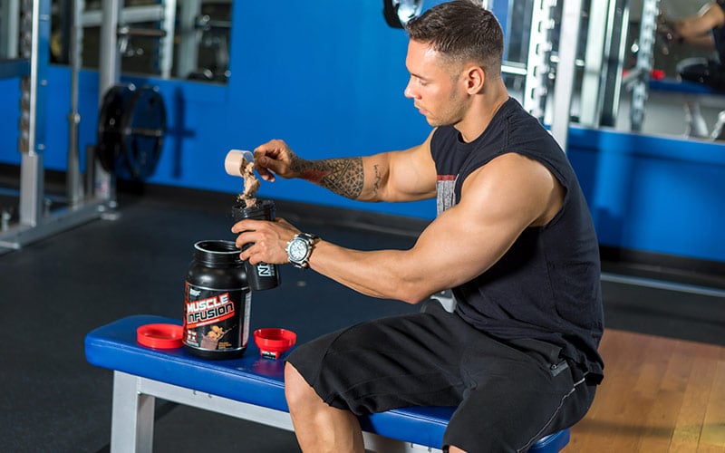 Nutrex athlete drinking post workout protein