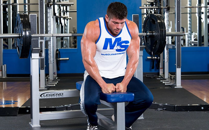 M&S Male Athlete Sitting on a Bench Press