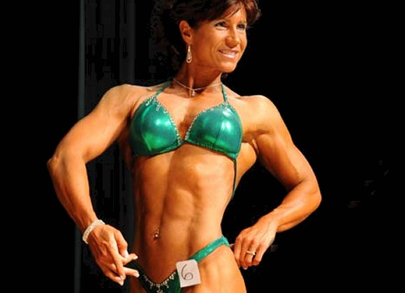 Tracy Debrita Gamelin Squatting
