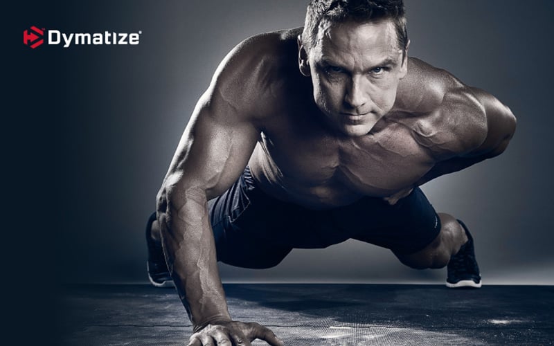 Dymatize Athlete Performing one handed pushup