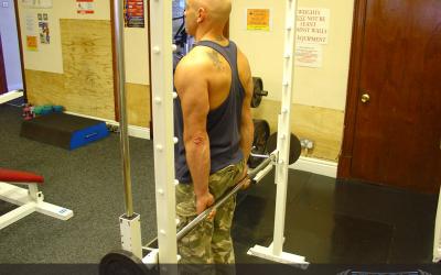 Standing Smith Machine Wrist Curl (behind back)