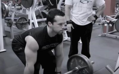 Bodybuilder doing deadlift in the gym