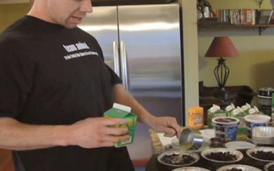 Bodybuilder making blueberry muffins