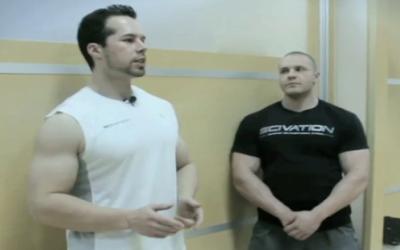 Two bodybuilders standing talking