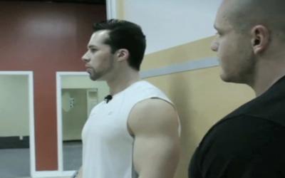 Two bodybuilders standing talking