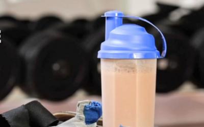 When protein in a shaker bottle sitting in the gym