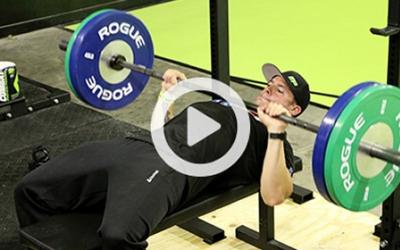 Cory Gregory doing a bench press in the gym
