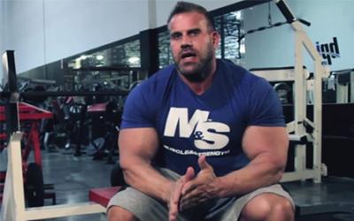 Bodybuilder Jay Cutler sitting in the gym