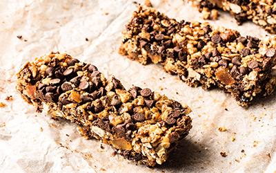 Close up of homemade chocolate peanut butter protein bars. 