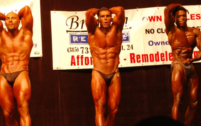 Joe Ohrablo bodybuilder posing on stage
