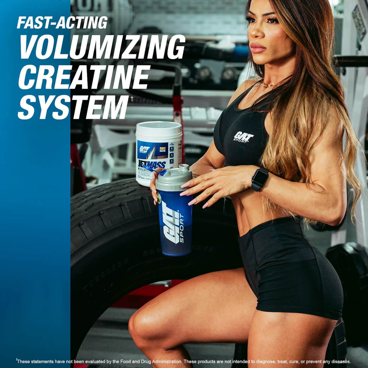Female athlete holding a GAT Sport shaker and a tub of JETMASS Fast-Acting Volumizing Creatine System