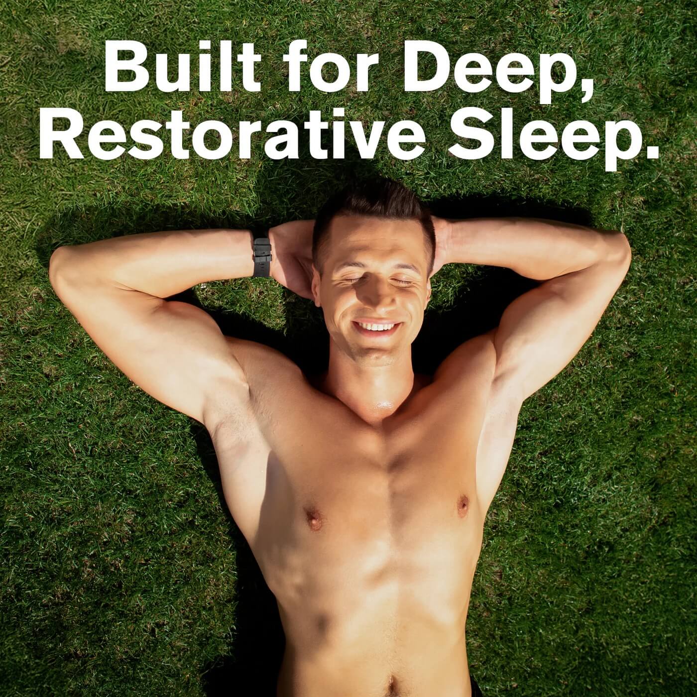 Male athlete resting on grass - Built for deep, restorative sleep