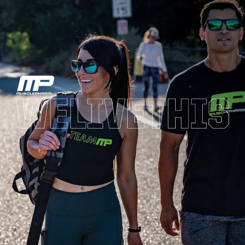 WELIVETHIS MusclePharm footer with male and female athletes walking down the street